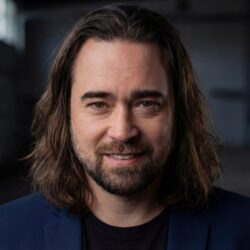 New headshot 2025 smiling_smaller